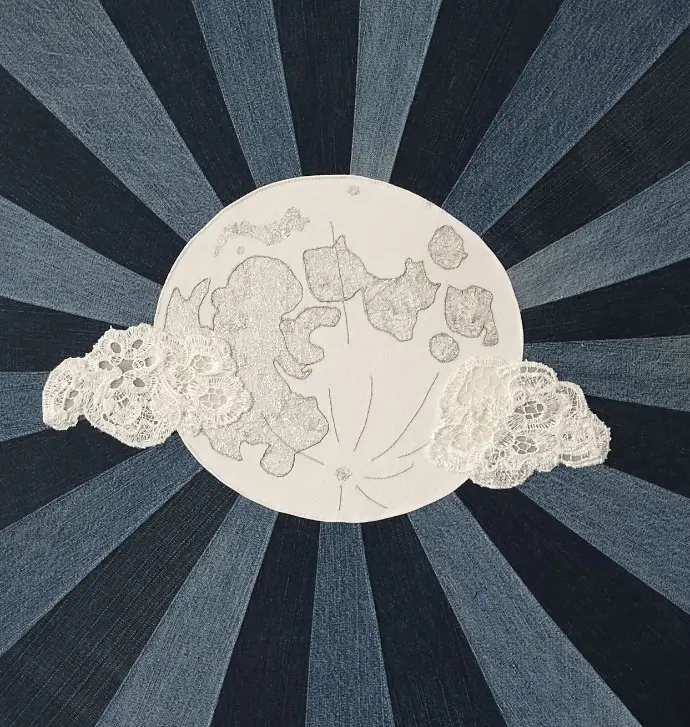 Recycled denim moon wall art